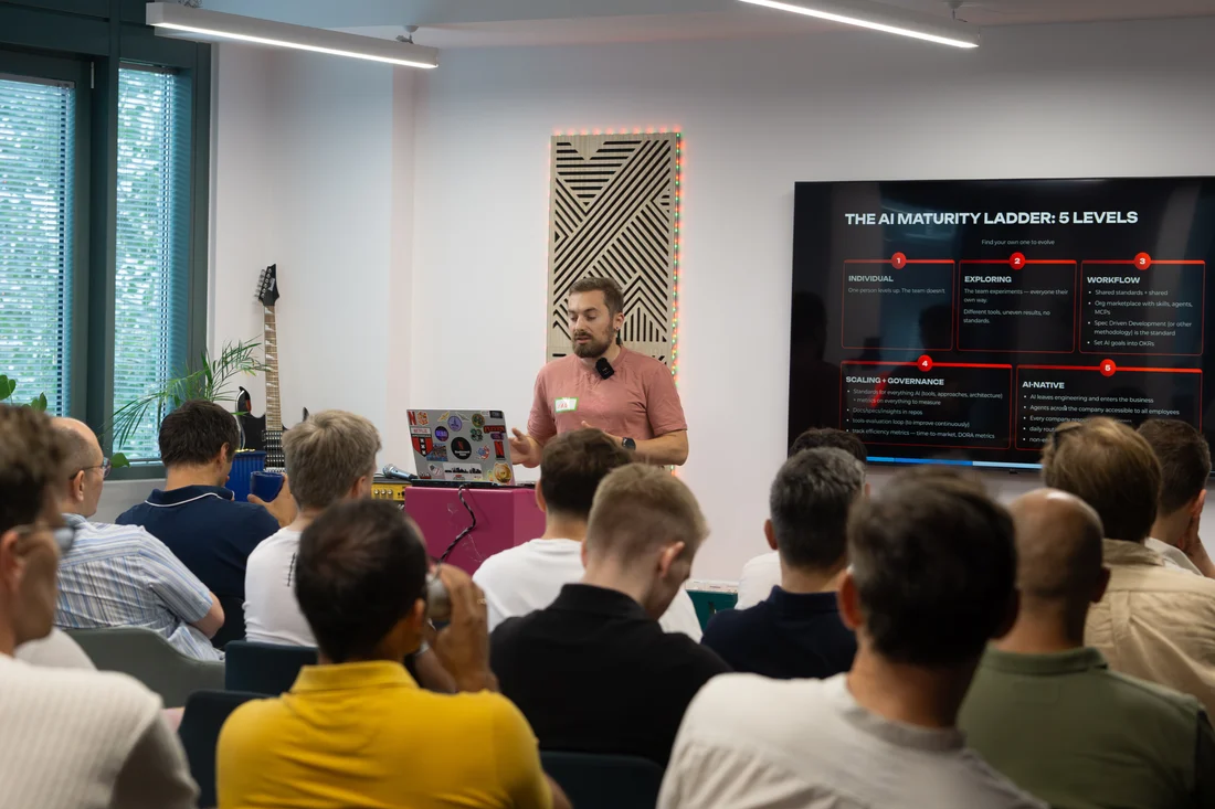 A speaker sharing a project with the June breakfast audience