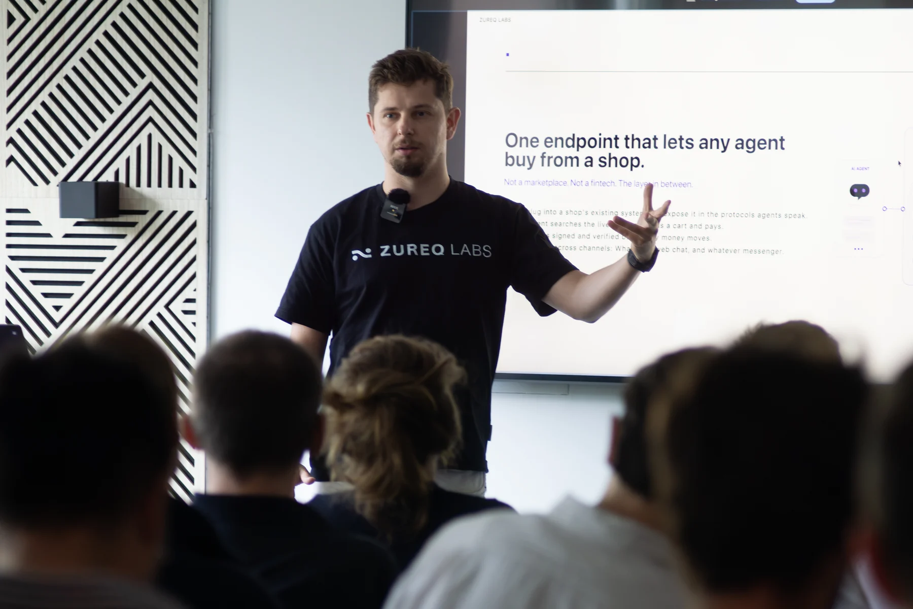 An AI Breakfast speaker presenting a working AI project to the audience
